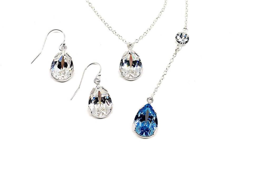 The Something Blue Backdrop Necklace from the Celina Collection. Swarovski crystal and sterling silver. https://twobewedjewelry.com/product/pear-shaped-bridal-jewelry-swarovski-crystal-celina-collection-bjs-celi/