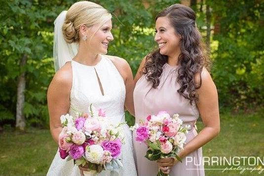 Beautiful women holding bouquets