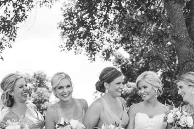 Bride and entourage in black and white