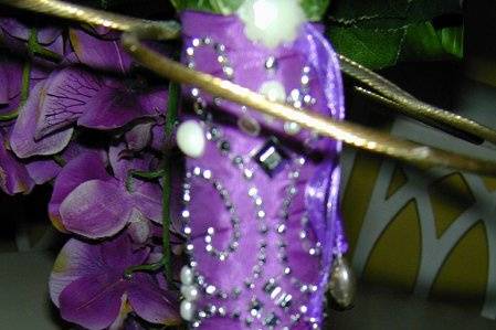 details of the handle of the brides bouquet. Hand applied rhinestones and pearls.