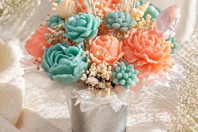 teal and coral wax bouquet.png