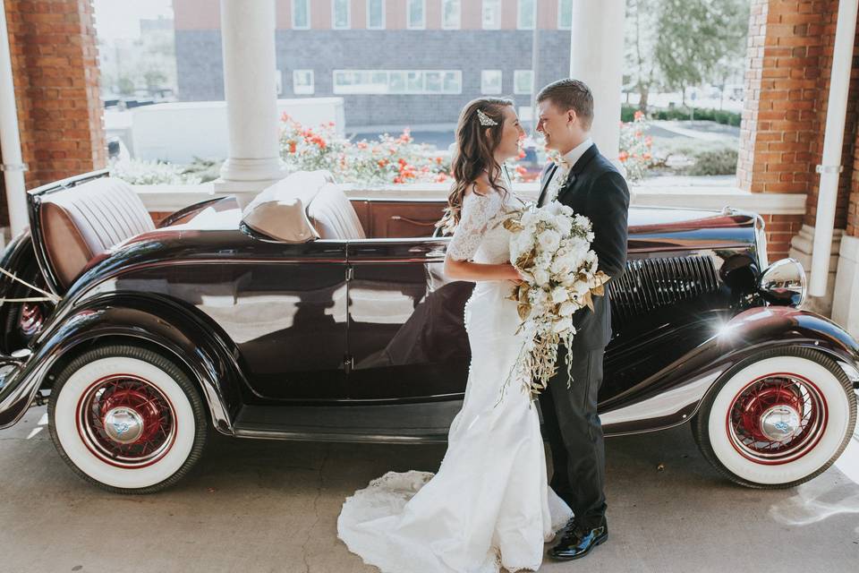 Portico Deck with vintage vehicle, photo credit: Bethany and Camera