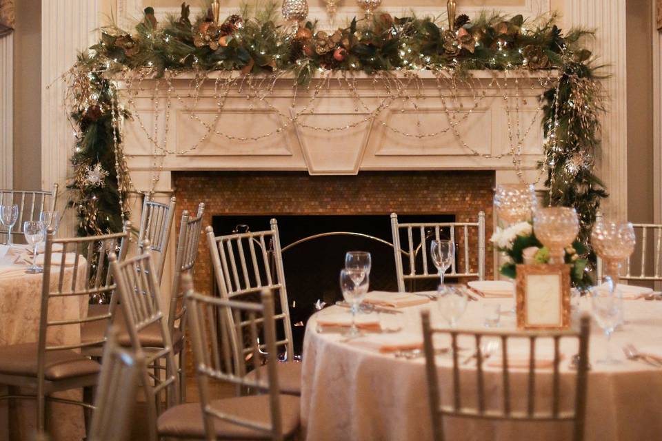 Fireplace decorated for a wedding, photo credit: Megan Savage Photography