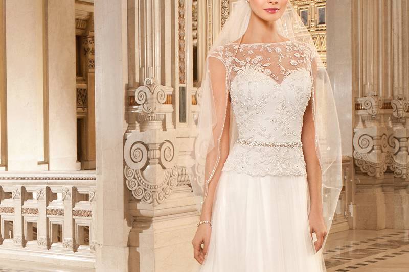 265This soft tulle a-line gown features a sweetheart bodice with a beaded tulle overlay, sheer beaded neckline and low sheer beaded back. Delicate beaded trim accentuates the waist.