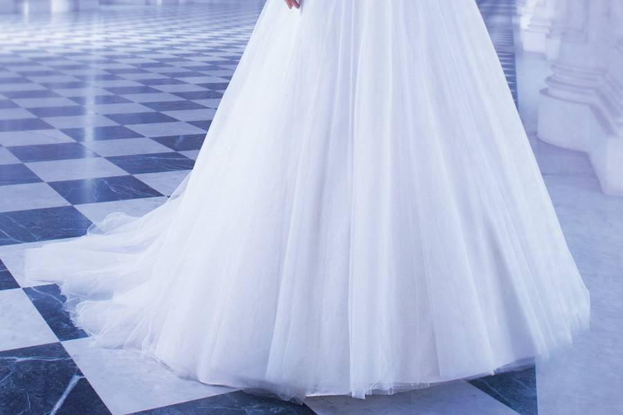 209Chiffon, One-shoulder, A-line destination wedding gown with asymmetrical ruching throughout bridal dress, high slit on skirt and Chapel length train.