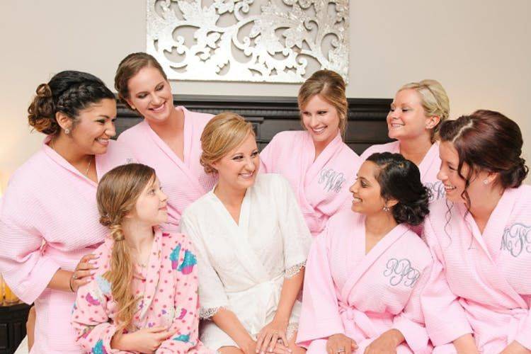 Bride and bridesmaids in dressing room