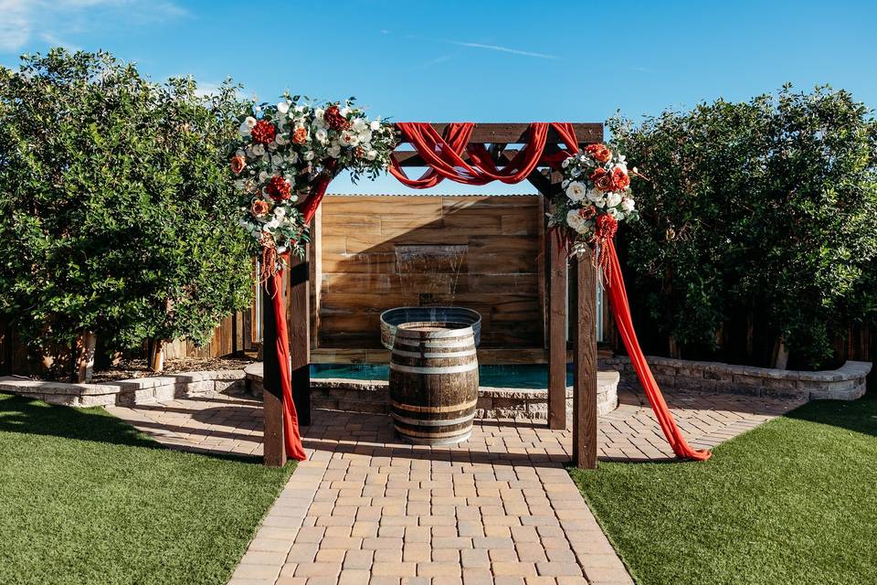 Groomsmen in front of barn doo