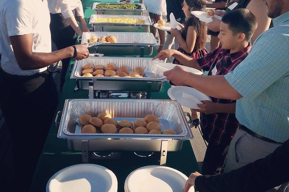 Rooftop Fundraiser, buffet style with servers.