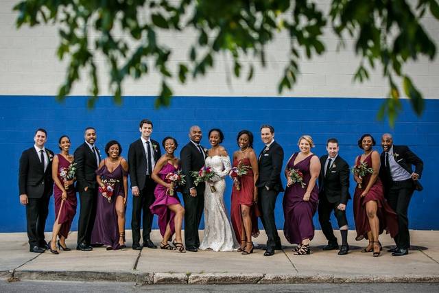 The couple with the bridesmaids and groomsmen