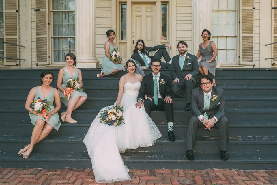 The couple with the bridesmaids and groomsmen