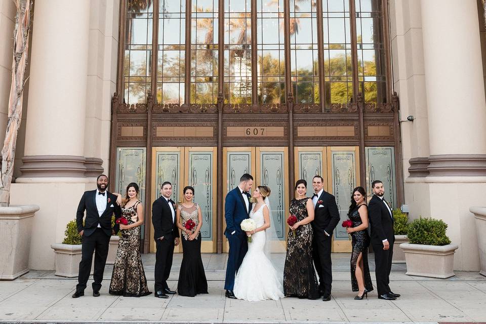 The couple with the bridesmaids and groomsmen