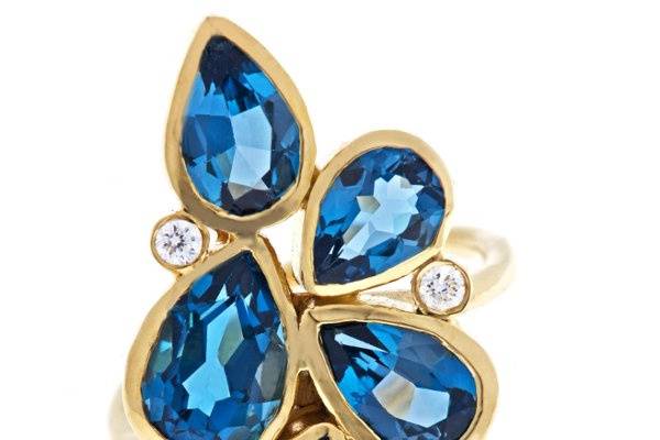 Cascade ring. London Blue topaz . 18k yellow gold .  diamonds.