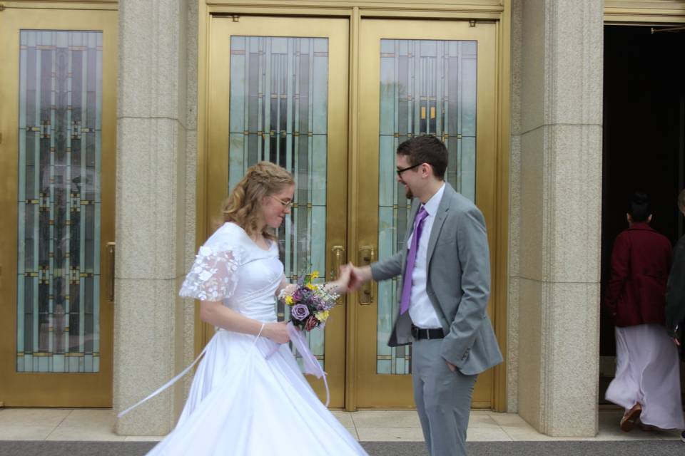 Couple exiting temple