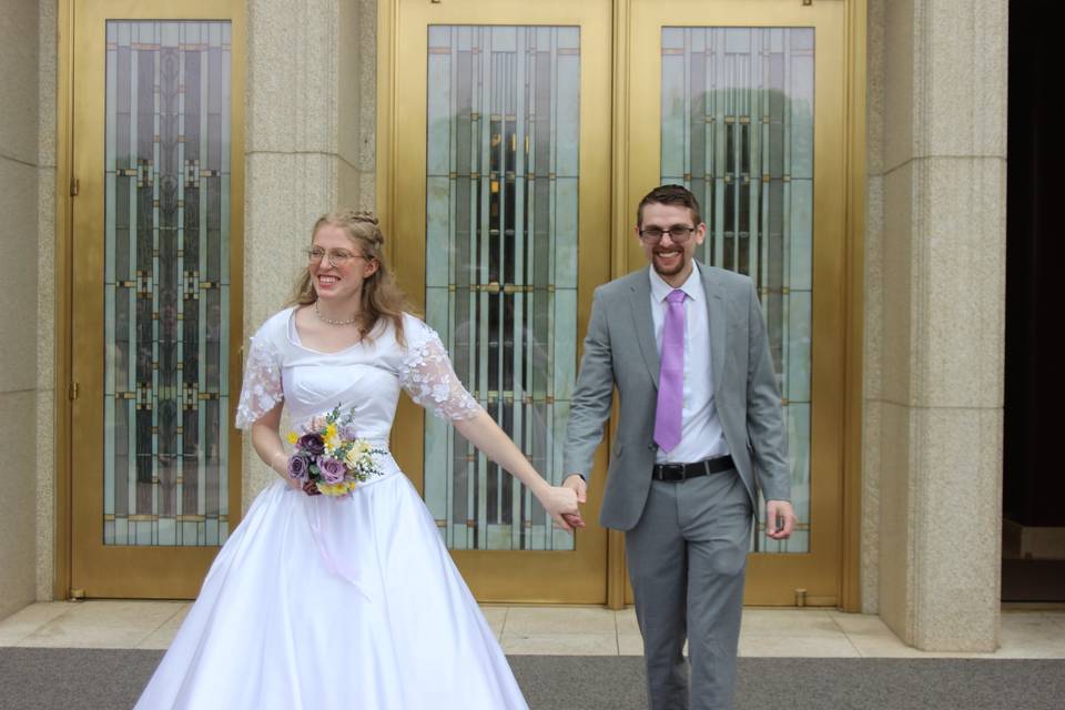 Couple exiting temple