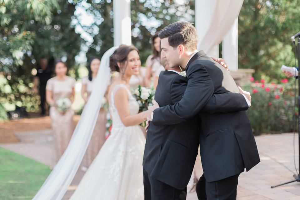 Groom Hugging Her Father