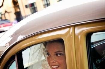 Bride waiting in 1956 Hudson right before the ceremony.