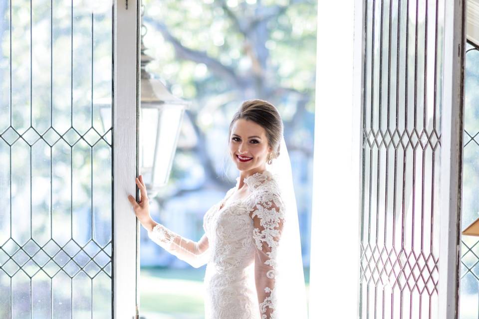 Bride in the doorway light