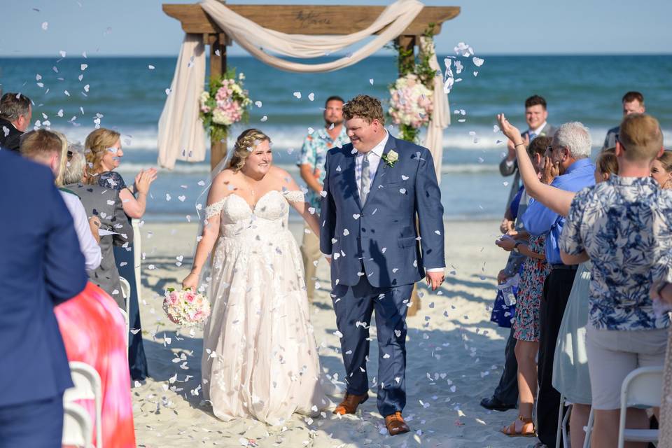 Flower petals by the ocean