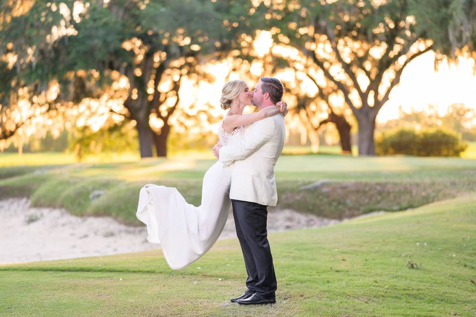 Holding hands under the oaks