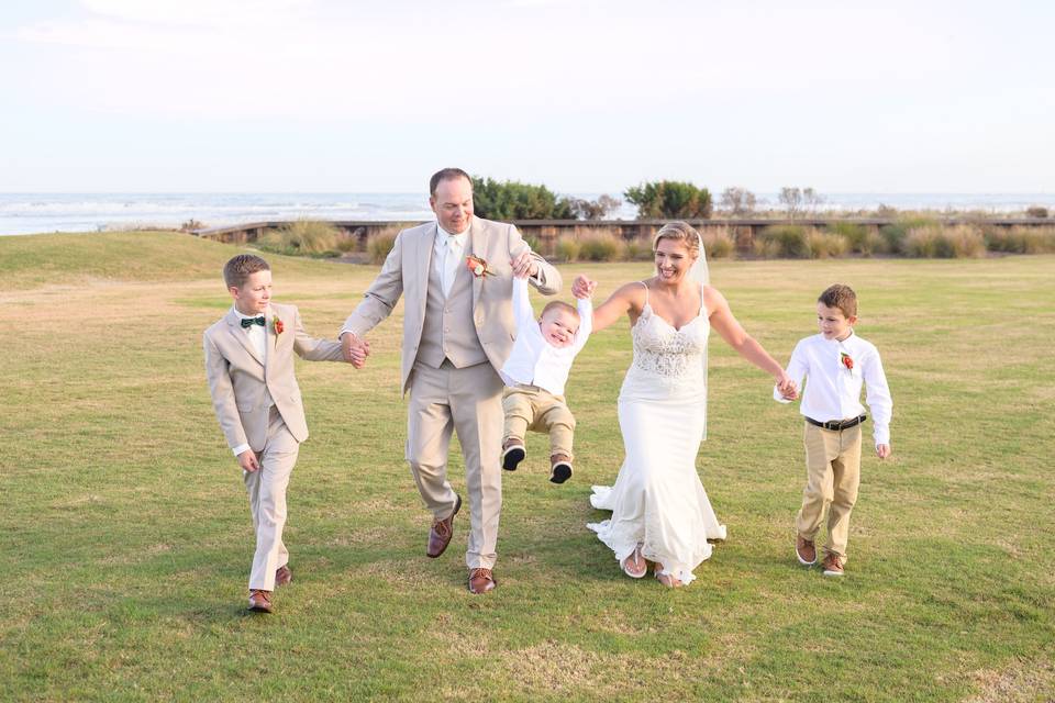 Cheers with the wedding party