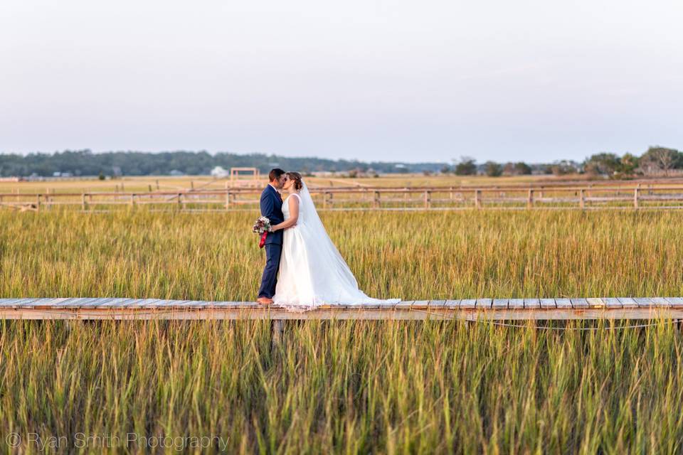 Kiss on the marsh boardwalk