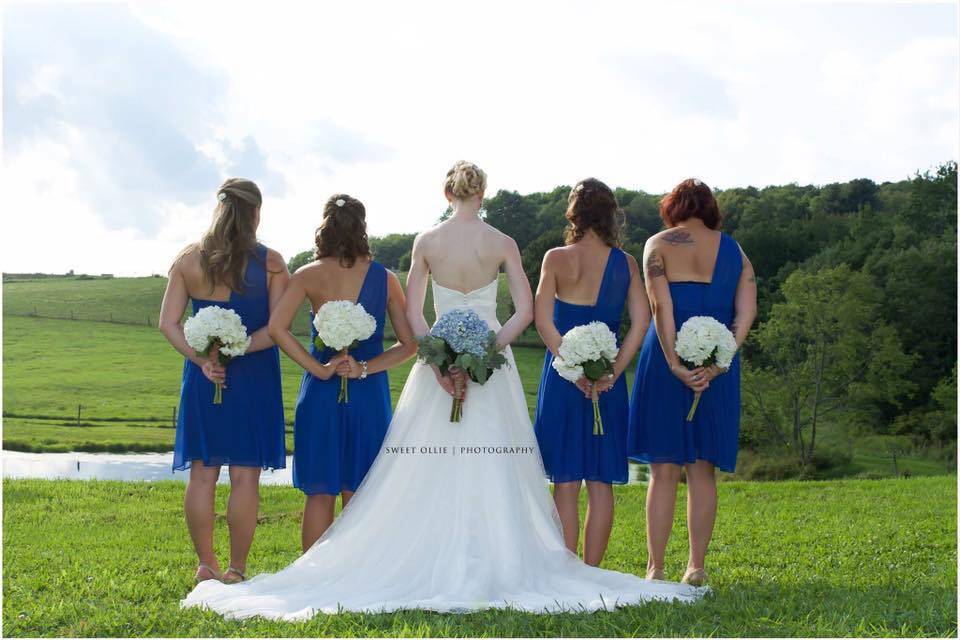 Bridesmaids by the pond