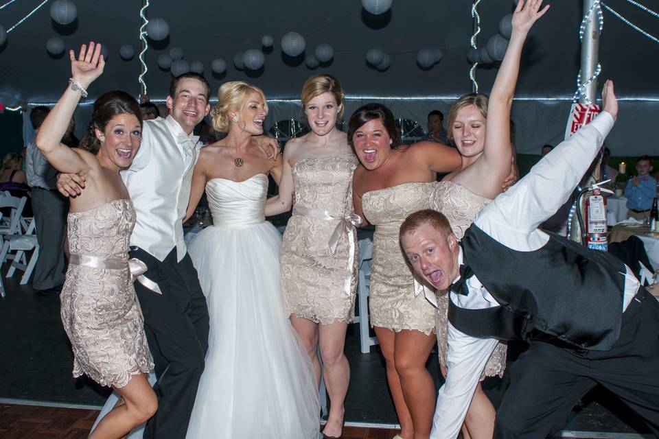 The couple with the bridesmaids and groomsmen