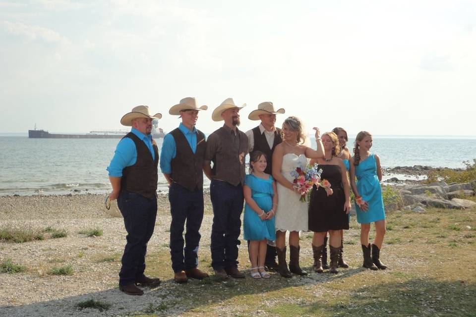 The couple with the bridesmaids and groomsmen