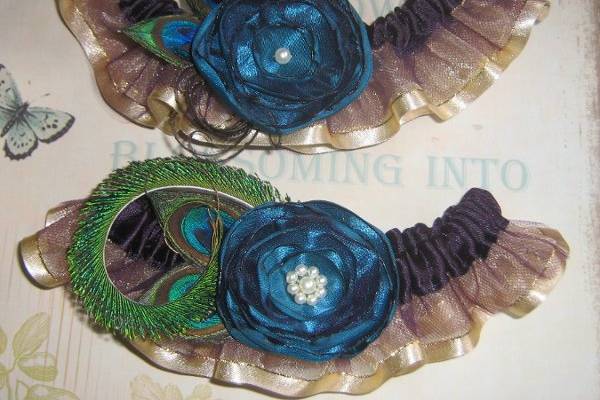 Custom Design Garter, Variation on a Theme, Eggplant Purple Satin, Gold Sheer Ruffles, Peacock Feathers and Teal Roses with Ivory Pearl Centers
