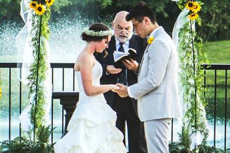 Couple exchanging rings