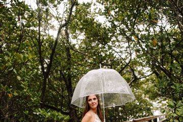 Rain won't stop this bride