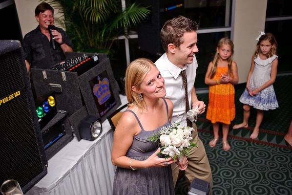 Jay with a bride & groom