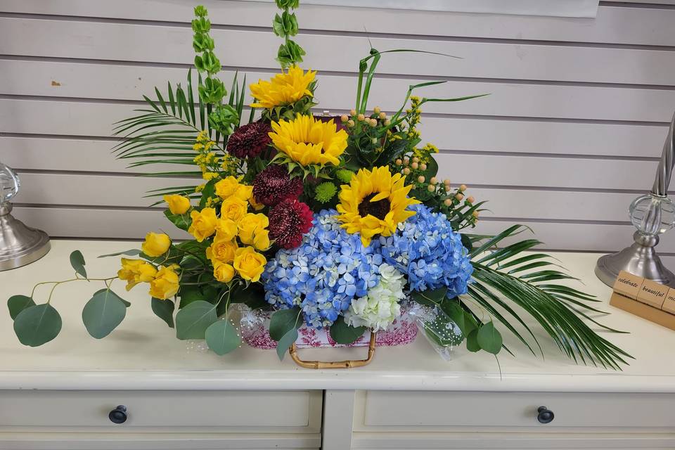 Florist Working In Her Flower Shopby Mosuno