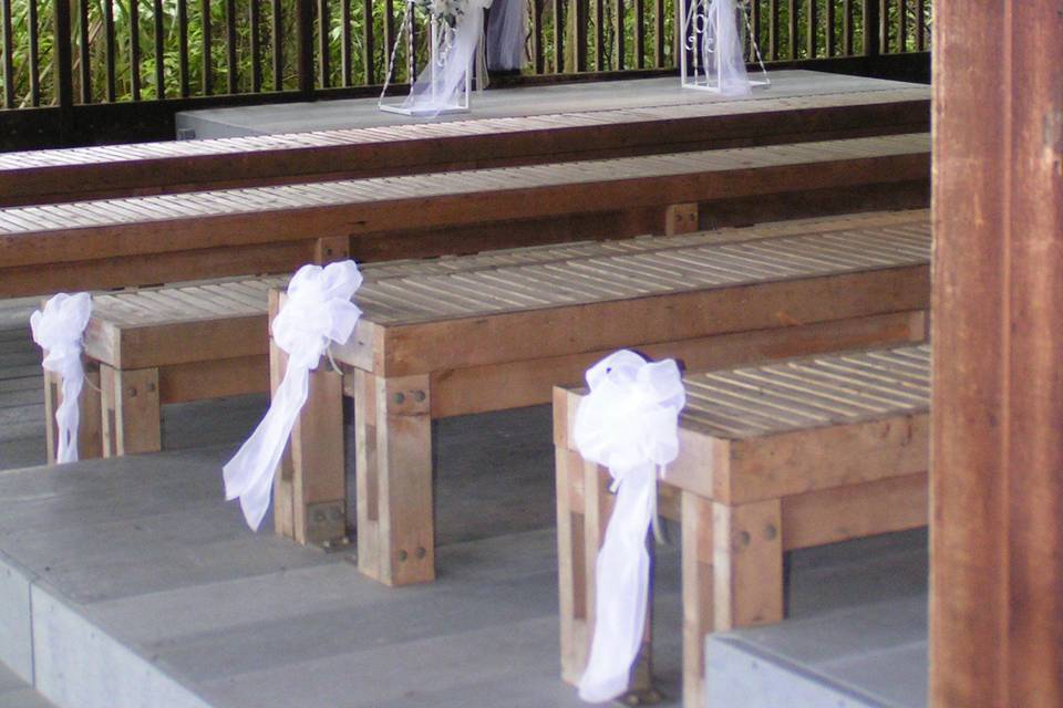 Fern Forest County Park Ampitheater for ceremonies & banquet hall for receptions. Our arch and railing decorations.