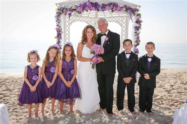 Our gazebo with silk flower garland in shades of purple.