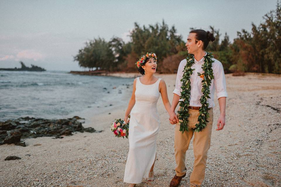 Couple leisurely walk hand in hand​