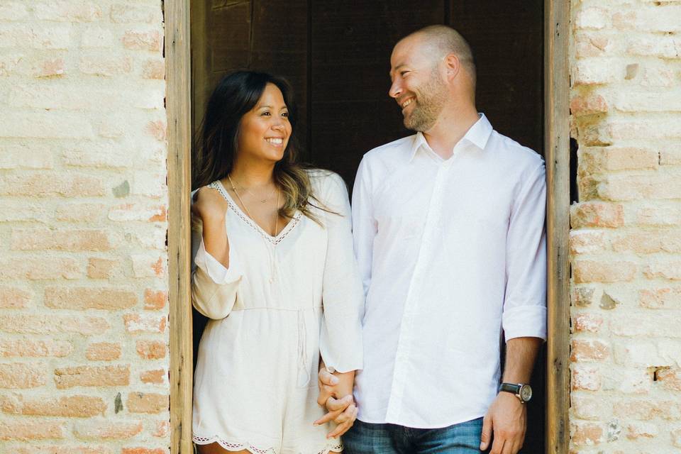 Smiling and holding hands - Burlap + Blossom Photography