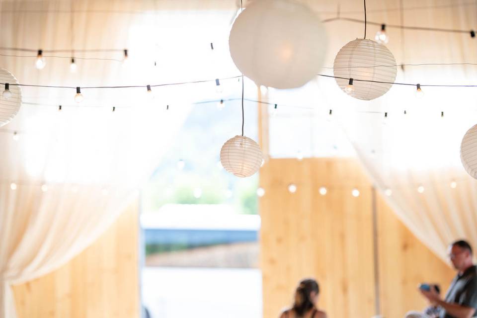 Curtains frame the barn doors