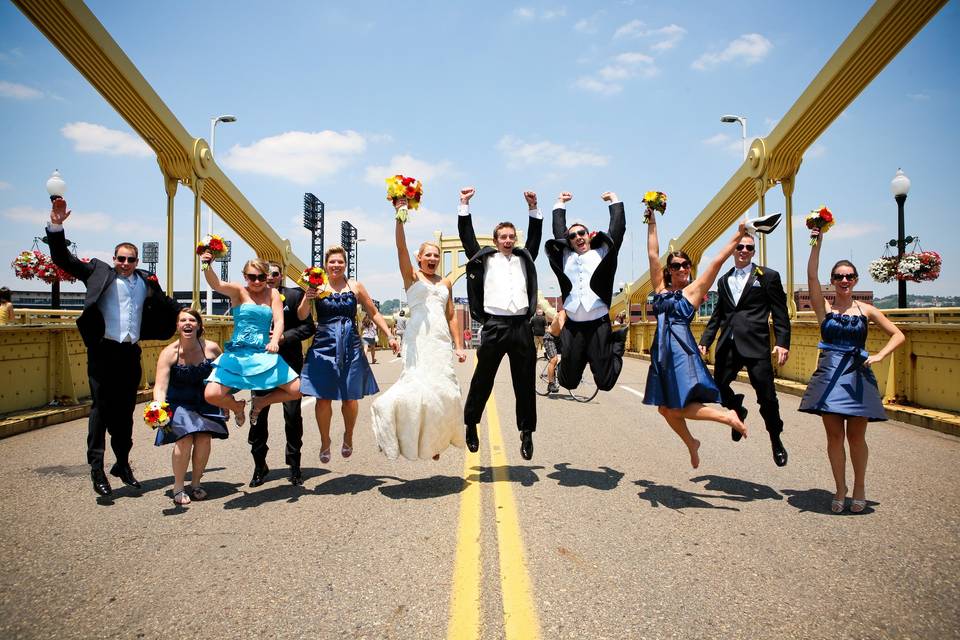 The couple with the bridesmaids and groomsmen