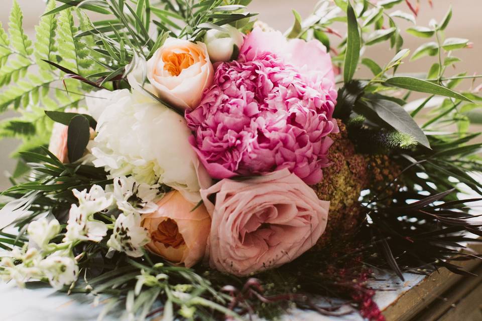 Wild Deluxe bridal bouquet with a pop of pink!