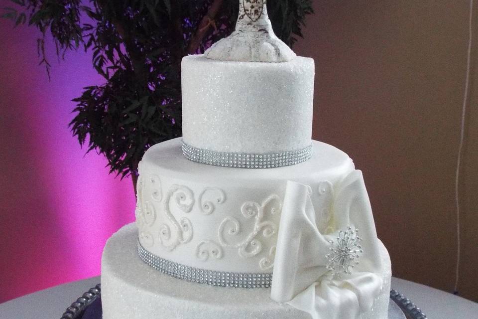 Whimsical Winter Wonderland Cake. Cake topper was handmade, whittled by the Bride's father.