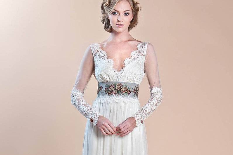 ABBEY <br>Ivory lace and cotton long sleeve wedding dress with a tulle skirt over luxurious platinum silk charmeuse accented with vintage Jacquard sash and silk roses.