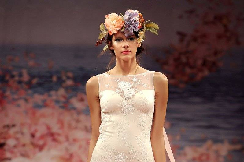 ALMA <br>Ivory floral embroidery with pearl silk and guipure embellished neckline and back.