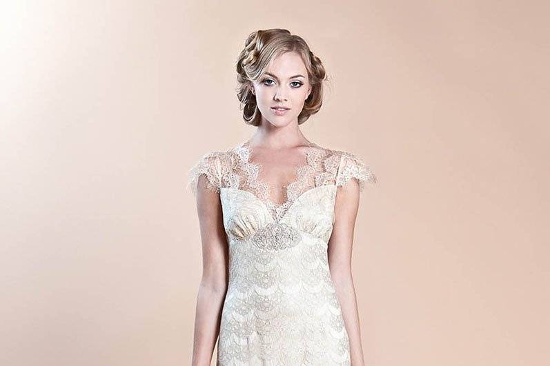 ELOQUENCE <br>A delicate gold eyelash scalloped vintage lace mermaid style wedding dress over sumptuous platinum silk with capped sleeves and sheer back.