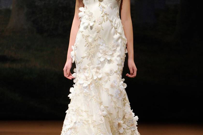 FLORA <br>Gold vines and ivory flowers scattered over tulle and silk with an open back.