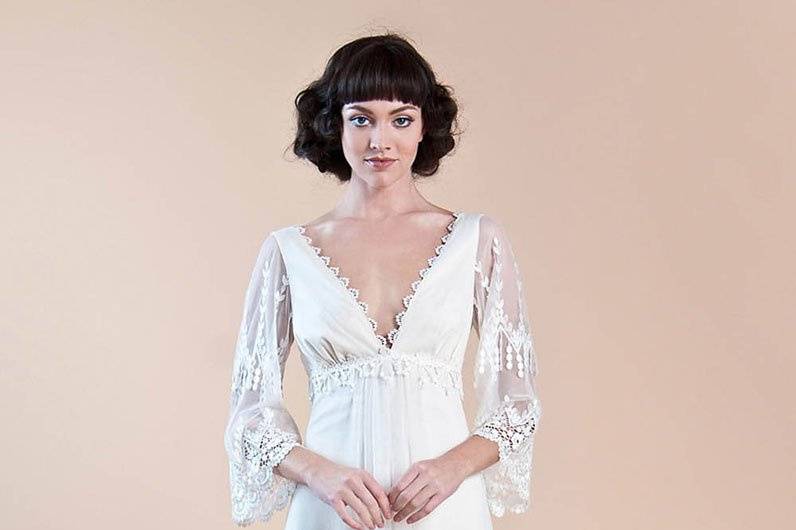 GRACE <br>Delicate guipure embroidered tulle wedding dress over ivory cotton underlay with vintage style lace details.