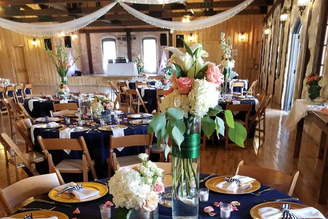 Stonehall Event CenterBlue Navy tablecloths with Ivory napkinsAnna,Texas