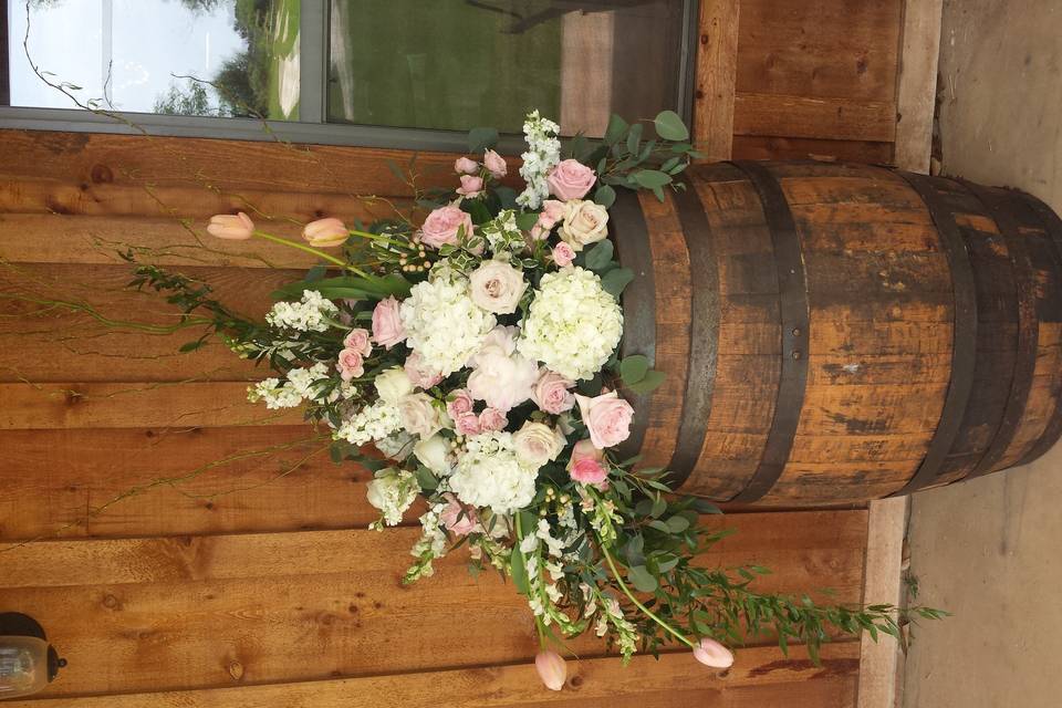 Wine Barrels and flowers ...can't go wrong with this combo