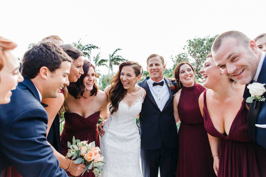 The couple with the bridesmaids and groomsmen