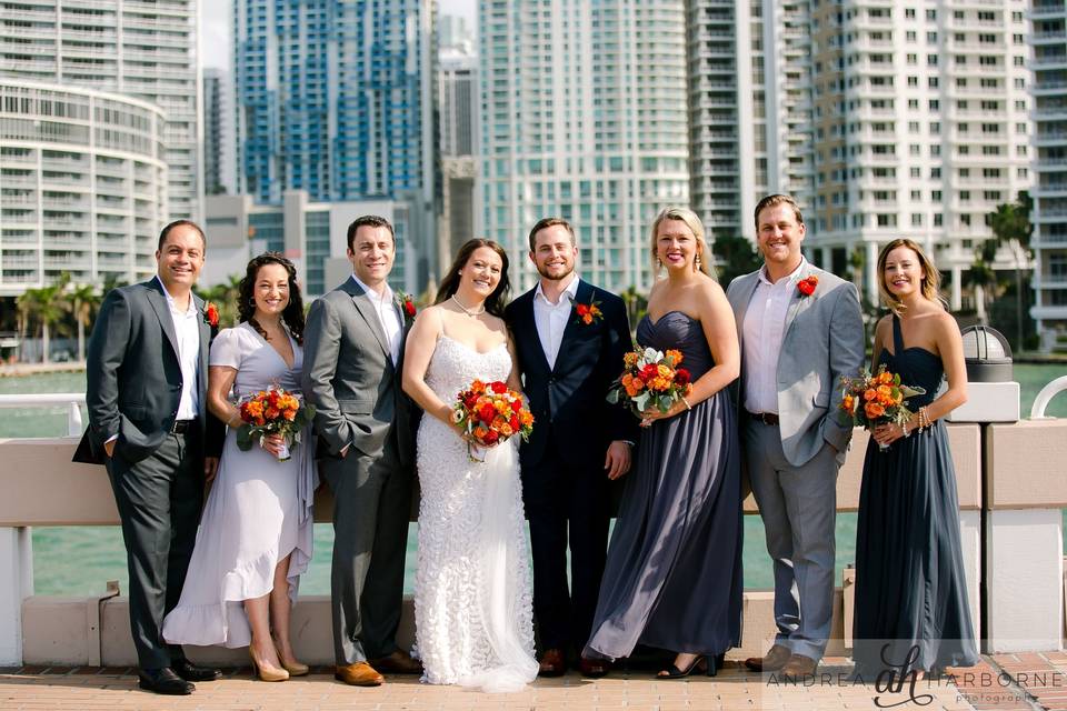 The couple with the bridesmaids and groomsmen